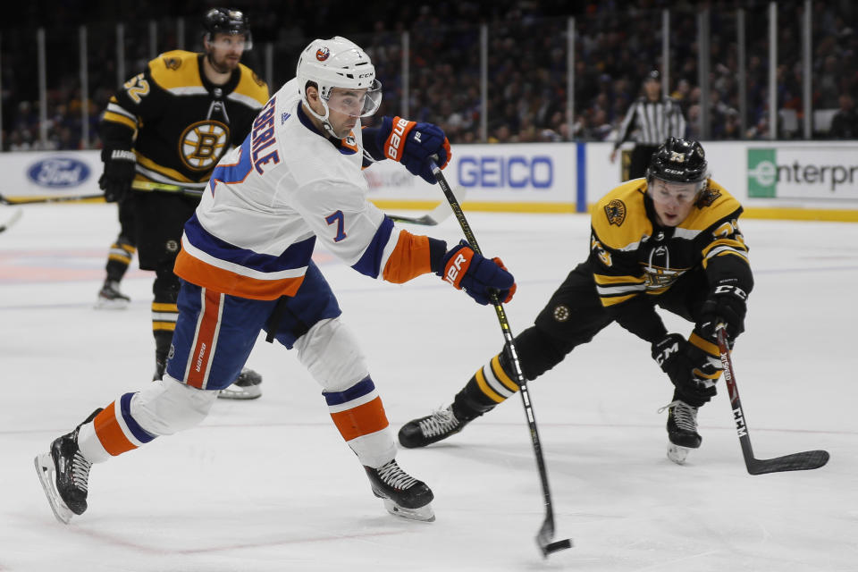 New York Islanders right wing Jordan Eberle (7) takes a shot on goal during the second period an NHL hockey game against the Boston Bruins, Saturday, Feb. 29, 2020, in Uniondale, NY. (AP Photo/John Minchillo)