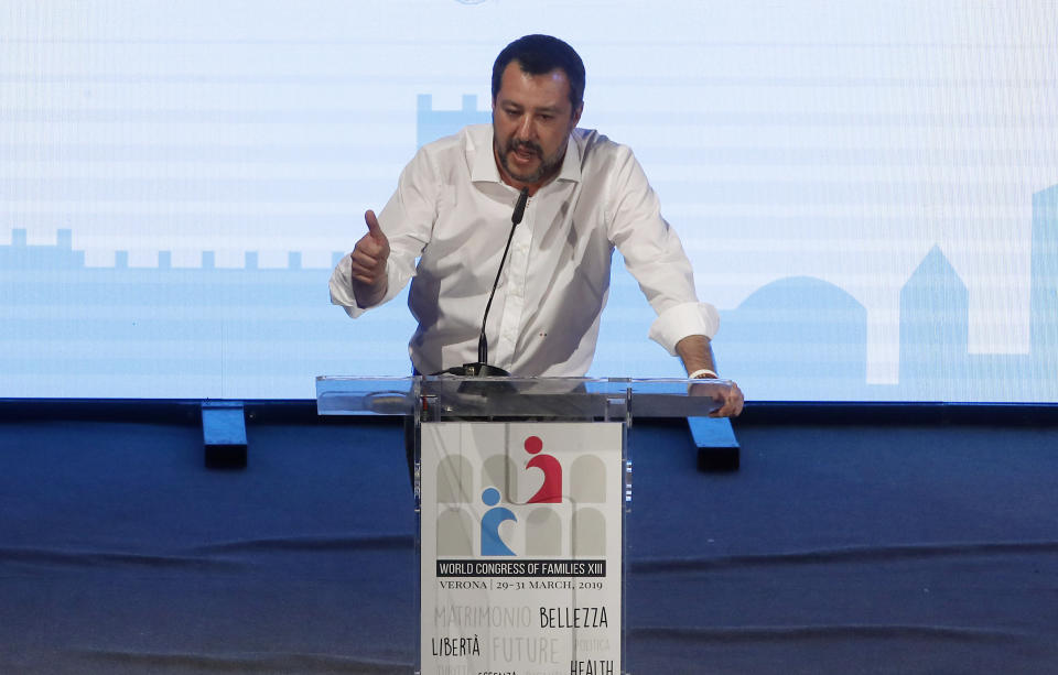 Italian Deputy-Premier Matteo Salvini delivers his speech at the World Congress of Families, in Verona, Italy, Saturday, March 30, 2019. A congress in Italy under the auspices of a U.S. organization that defines family as strictly centering around a mother and father has made Verona — the city of Romeo and Juliet — the backdrop for a culture clash over family values, with a coalition of civic groups mobilizing against what they see as a counter-reform movement to limit LGBT and women's rights. (AP Photo/Antonio Calanni)