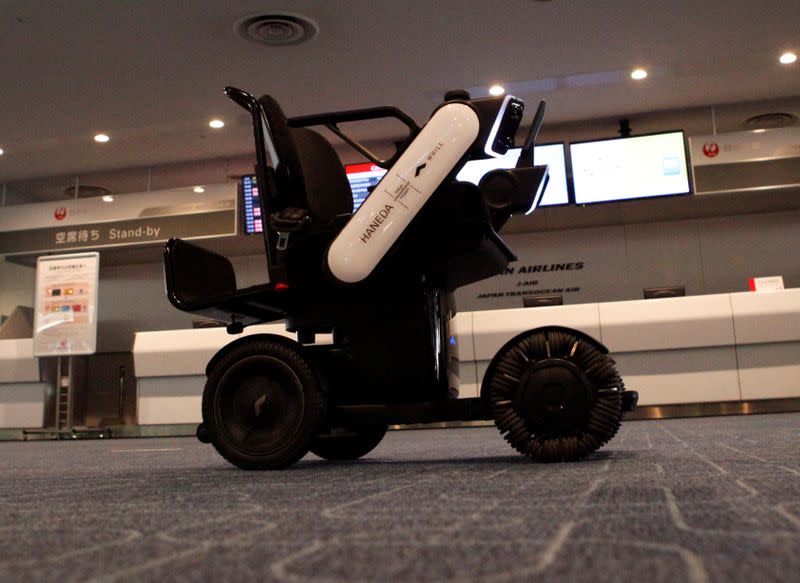 An autonomous personal mobility device developed by WHILL, Inc. is seen during it's trial at Haneda Airport in Tokyo