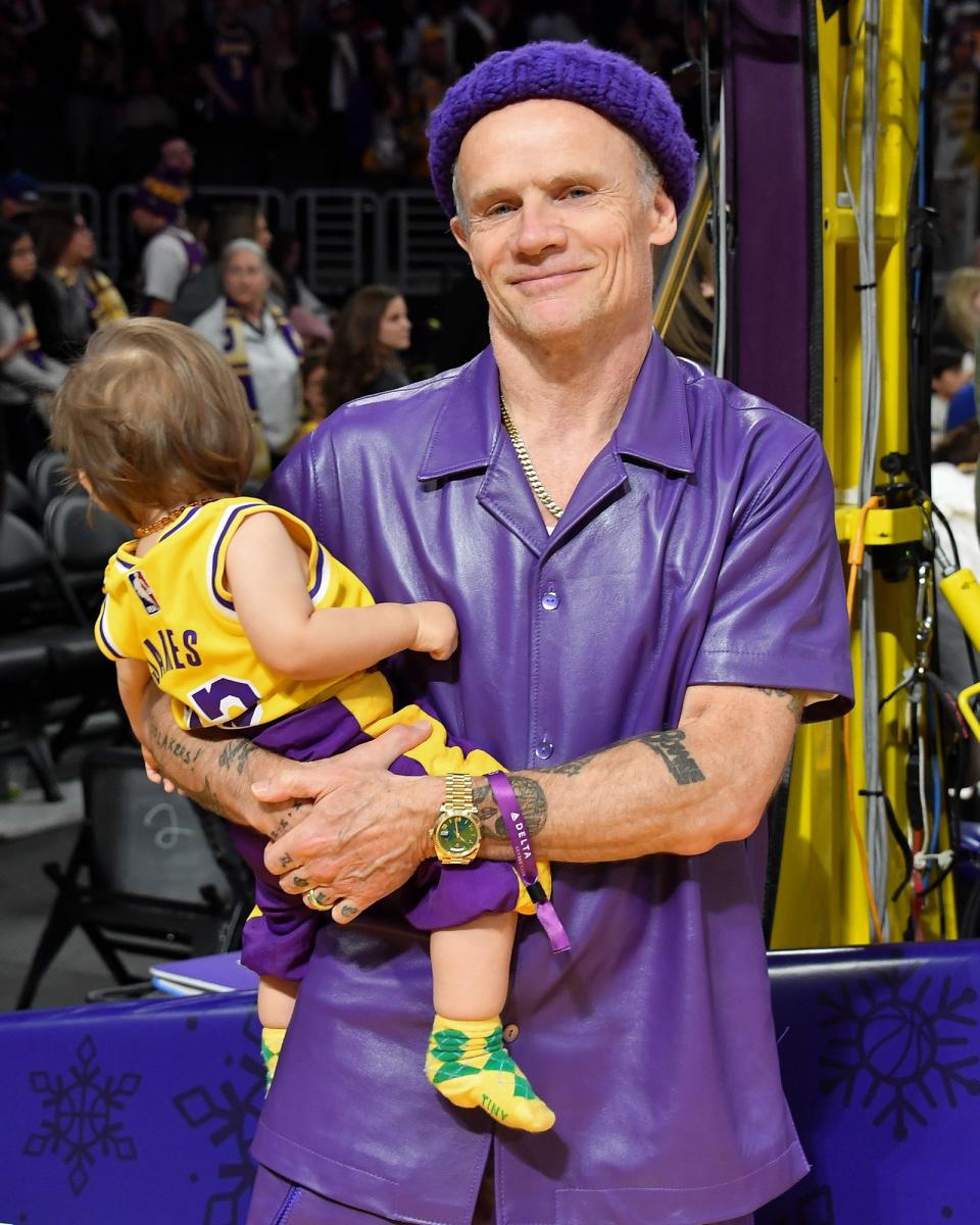 <h1 class="title">Celebrities At The Los Angeles Lakers Game</h1><cite class="credit">Allen Berezovsky/Getty Images</cite>