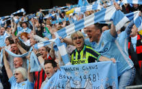 Manchester City's supporters celebrate after their team's 3-2 victory over Queens Park Rangers in the English Premier League football match between Manchester City and Queens Park Rangers at The Etihad stadium in Manchester, north-west England on May 13, 2012. Manchester City won the game 3-2 to secure their first title since 1968. This is the first time that the Premier league title has been decided on goal-difference, Manchester City and Manchester United both finishing on 89 points. AFP PHOTO/PAUL ELLIS RESTRICTED TO EDITORIAL USE. No use with unauthorized audio, video, data, fixture lists, club/league logos or 'live' services. Online in-match use limited to 45 images, no video emulation. No use in betting, games or single club/league/player publications.PAUL ELLIS/AFP/GettyImages