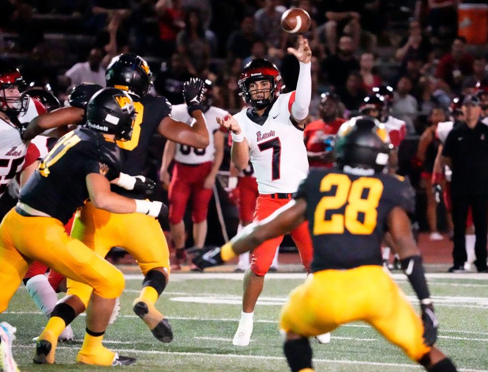 Sep 30, 2022; Scottsdale, AZ, USA; Liberty Lions quarterback Navi Bruzon (7) throws a pass against the Saguaro Sabercats during a game played at Saguaro High. Mandatory Credit: Rob Schumacher-Arizona Republic