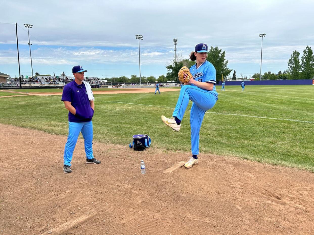 Former MLB pitcher Andrew Albers (left) is the Saskatoon Berries pitching coach. ( Trevor Bothorel/CBC  - image credit)