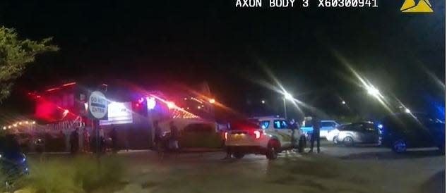 One person was arrested after a large fight that broke out in the Coyote Ugly Saloon parking lot early Sunday morning left several people unconscious and one with a stab wound.