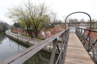 A pedestrian bridge is seen deserted amid concerns about the spread of coronavirus disease (COVID-19), in Milan