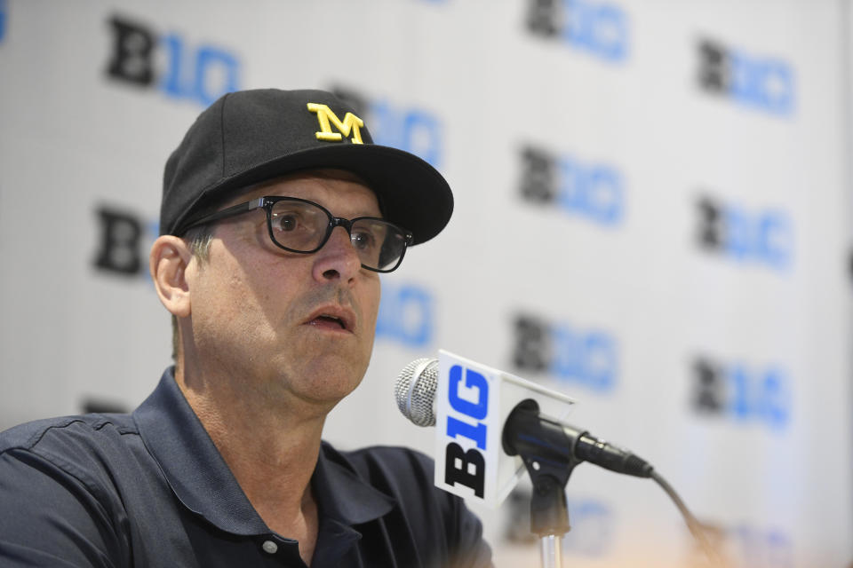 Michigan head coach Jim Harbaugh speaks at the Big Ten Conference NCAA college football Media Days in Chicago, Monday, July 23, 2018. (AP Photo/Annie Rice)