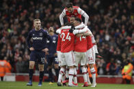 Arsenal's Alexandre Lacazette celebrates his goal after a video review with teammates during the Premier League soccer match between Arsenal and West Ham at the Emirates Stadium in London, Saturday, March 7, 2020. Arsenal won 1-0. (AP Photo/Matt Dunham)