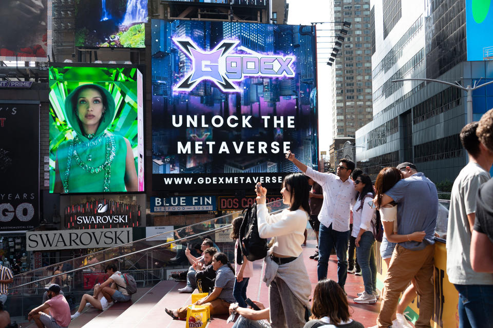 A billboard reads "unlock the metaverse" in Times Square during the 4th annual NFT.NYC conference on June 20, 2022 in New York City.<span class="copyright">Noam Galai—Getty Images</span>