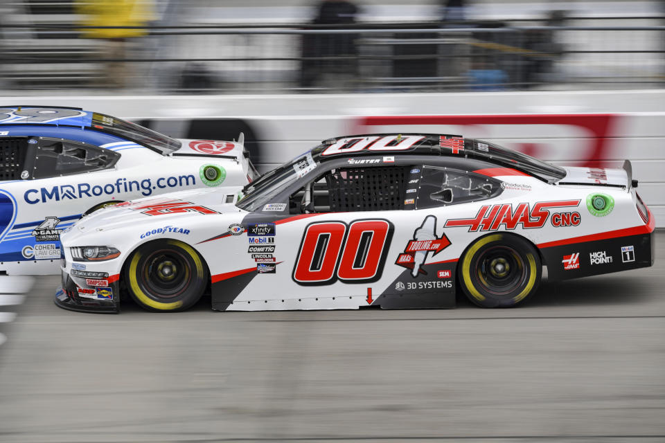 Cole Custer (00) attempts to pass Ryan Sieg (39) during a NASCAR Xfinity Series auto race at Richmond Raceway on Saturday, April 1, 2023, in Richmond, Va. (AP Photo/Mike Caudill)