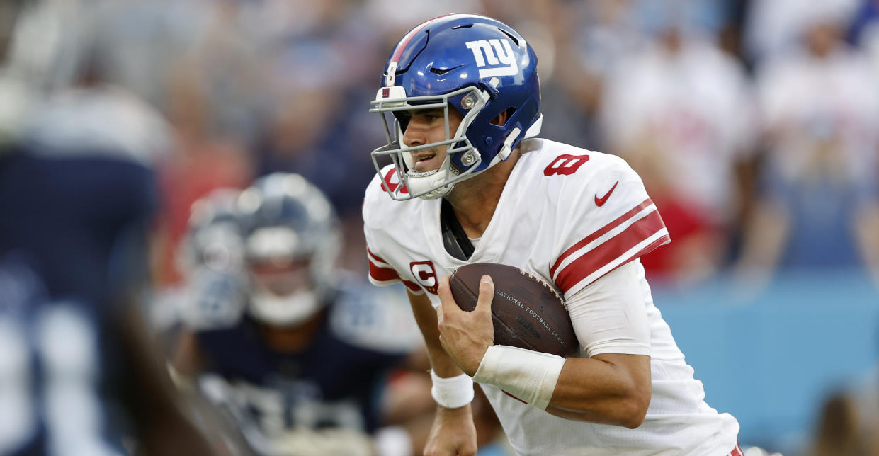  Quarterback Daniel Jones #8 of the New York Giants runs the ball during the second half against the Tennessee Titans at Nissan Stadium on September 11, 2022 in Nashville, Tennessee. 