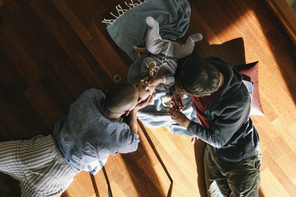 Overhead View of Fathers Enjoying Time with Baby