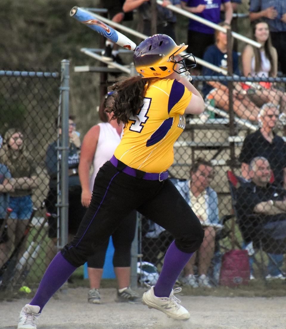 Holland Patent's Ella Armitage follows through on her swing and delivers a tie-breaking single with the bases loaded during the sixth inning of Wednesday's game in Little Falls.