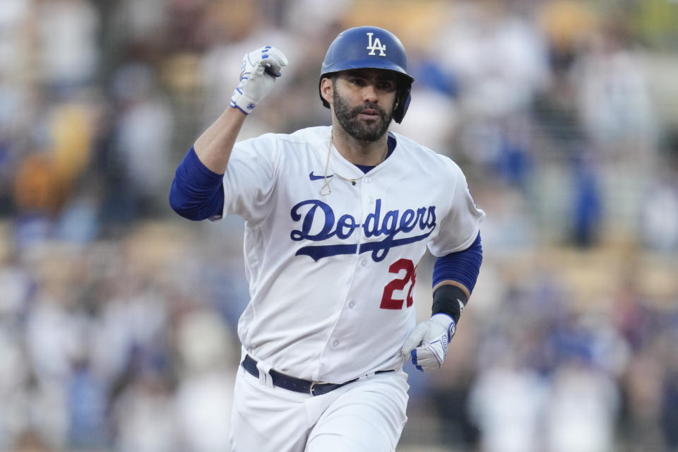 Los Angeles Dodgers designated hitter J.D. Martinez (28) runs the bases after hitting a home run during the second inning of a baseball game against the San Francisco Giants in Los Angeles, Saturday, Sept. 23, 2023. (AP Photo/Ashley Landis)