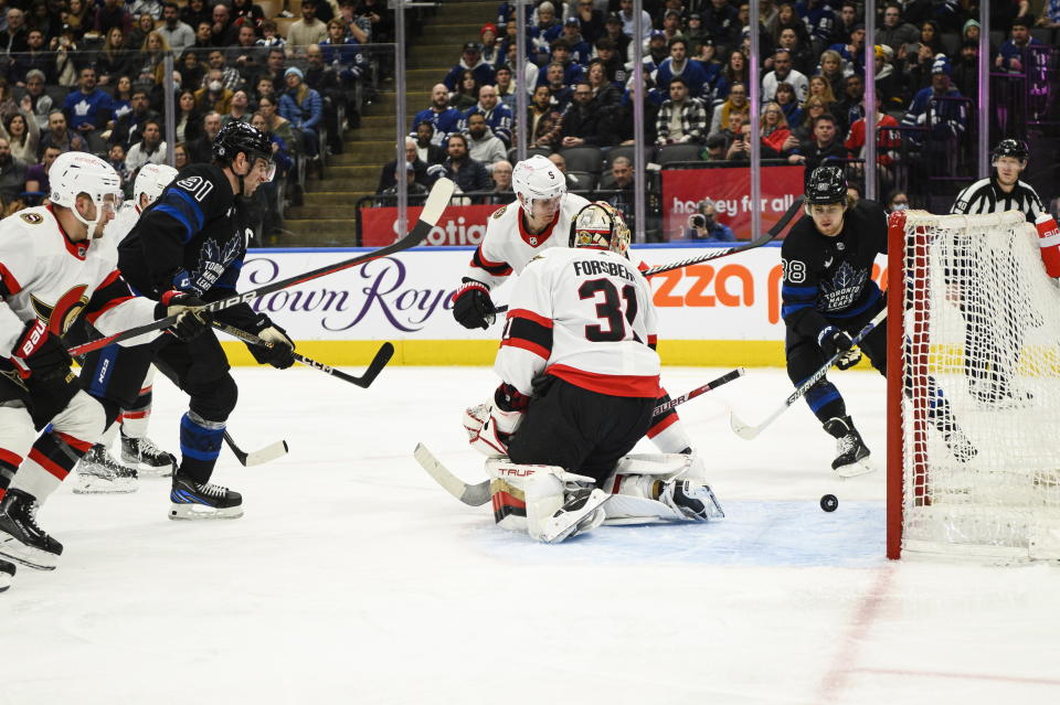 Toronto Maple Leafs forward William Nylander (88) scores on Ottawa Senators goaltender Anton Forsberg (31) during the second period of an NHL hockey game Friday, Jan. 27, 2023, in Toronto. (Christopher Katsarov/The Canadian Press via AP)