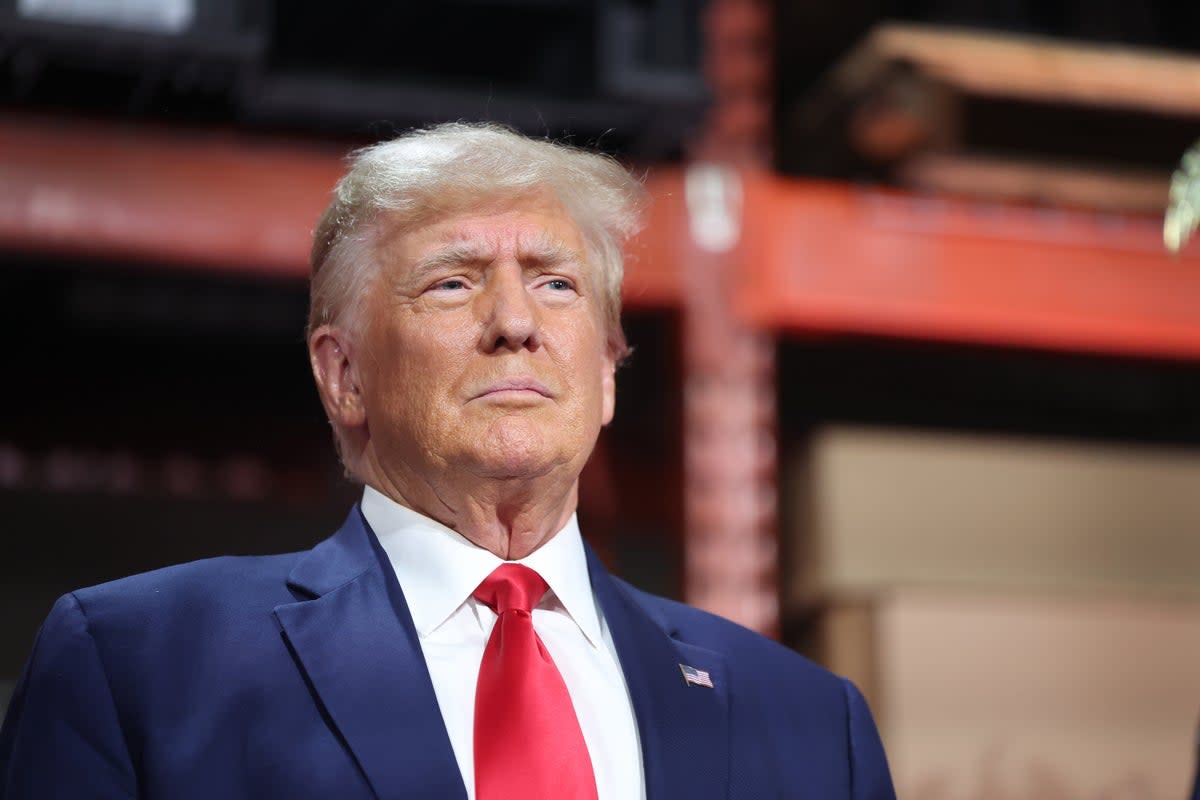 Republican presidential candidate former President Donald Trump speaks to guests during a campaign stop at Drake Enterprises, an automotive parts manufacturer, on September 27, 2023 in Clinton Township, Michigan. (Getty Images)