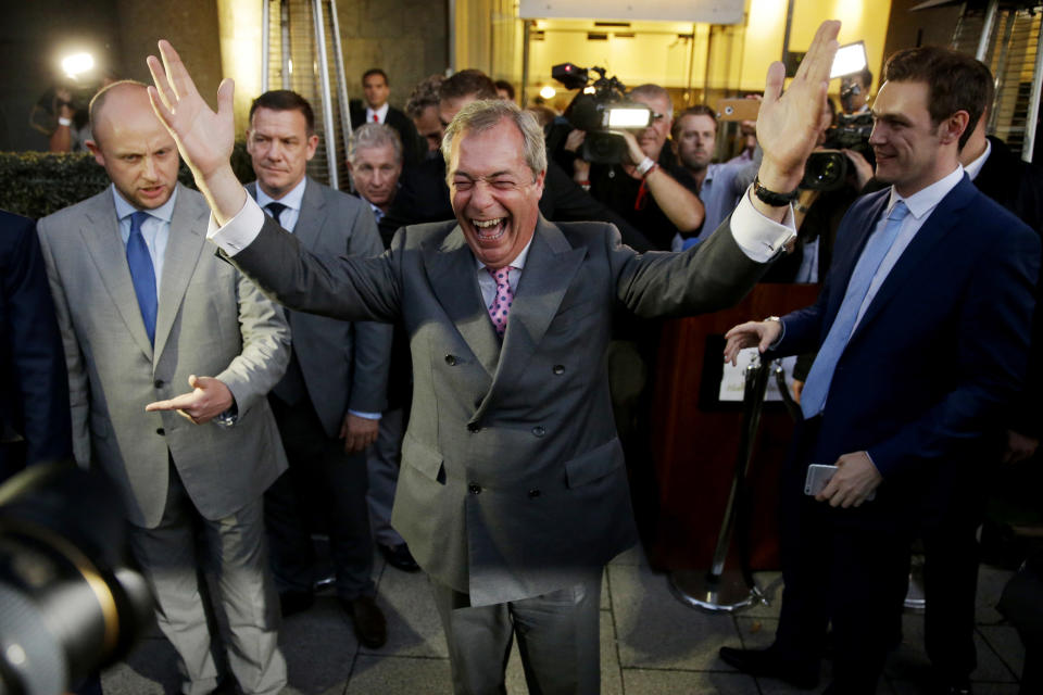 FILE - In this June 24, 2016 file photo, Nigel Farage, the leader of the UK Independence Party, celebrates and poses for photographers as he leaves a "Leave.EU" organization party for the British European Union membership referendum in London. Five years ago, Britons voted in a referendum that was meant to bring certainty to the U.K.’s fraught relationship with its European neigbors. Voters’ decision on June 23, 2016 was narrow but clear: By 52 percent to 48 percent, they chose to leave the European Union. It took over four years to actually make the break. The former partners are still bickering, like many divorced couples, over money and trust. (AP Photo/Matt Dunham, File)