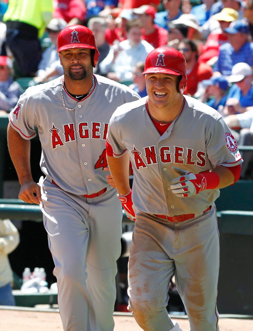 Mike Trout (right) began to overshadow Albert Pujols in Los Angeles almost from the start of Pujols' debut with the Angeles in 2012.