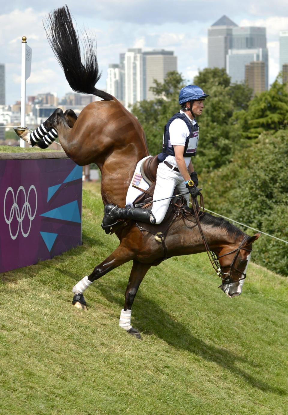 Boyd Martin of the USA riding Otis Barbotiere in the Cross Country of the London 2012 Olympic Games Equestrian Eventing competition in Greenwich Park, south east London, Britain, 30 July 2012. EPA/FRANCK ROBICHON