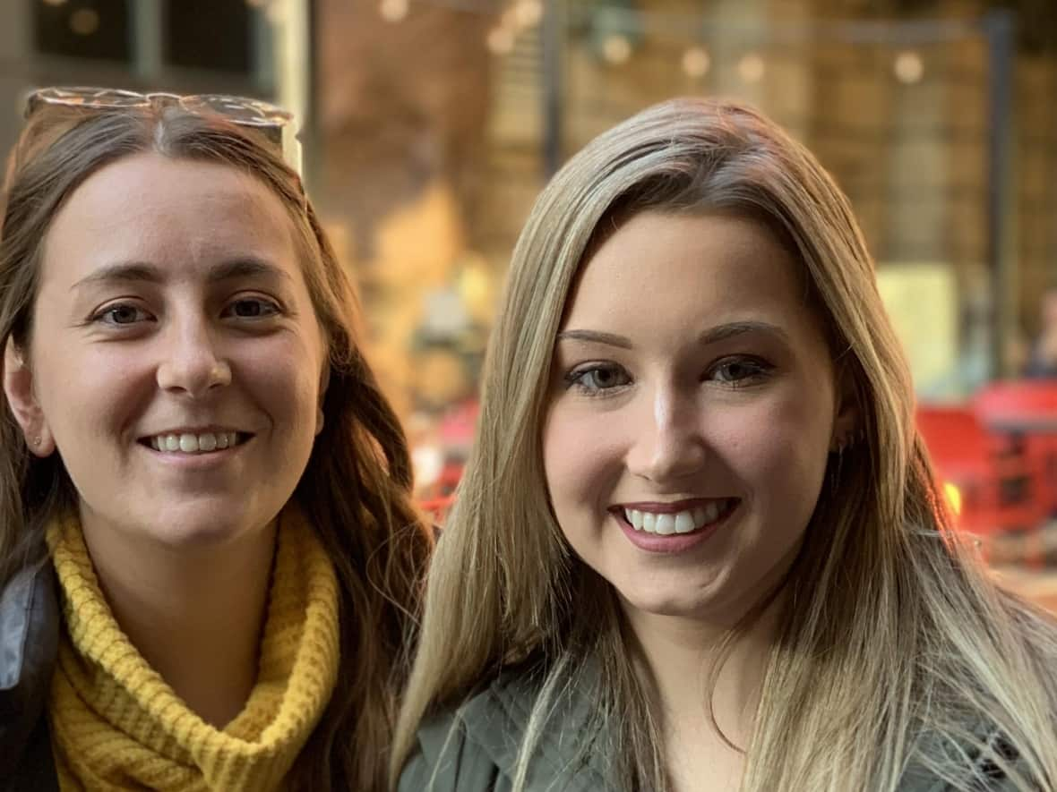 Carlie McMaster, left, of Brantford, Ont., and Rylee Hall, who lives in the U.S., found each other through Ancestry.com. They learned, through DNA testing, that they have the same biological dad. (Submitted by Carlie McMaster - image credit)