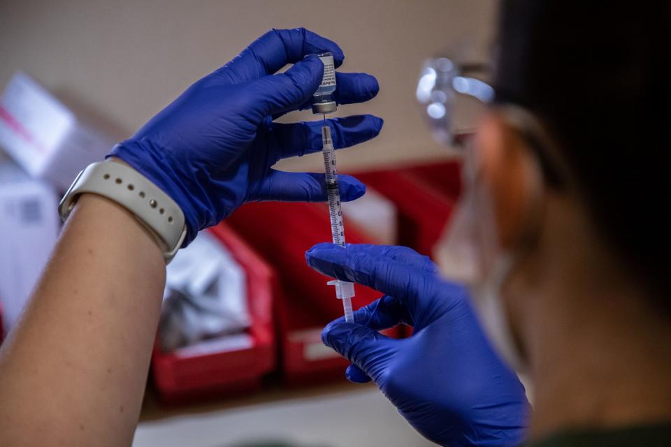 Nicole Costa, pharmacy manager at Amita Health Presence Medical Center in Joliet, Ill., prepares the COVID-19 vaccine to be administered to medical personnel on December 16, 2020. (Photo by Zbigniew Bzdak/Chicago Tribune/TNS/Sipa USA)