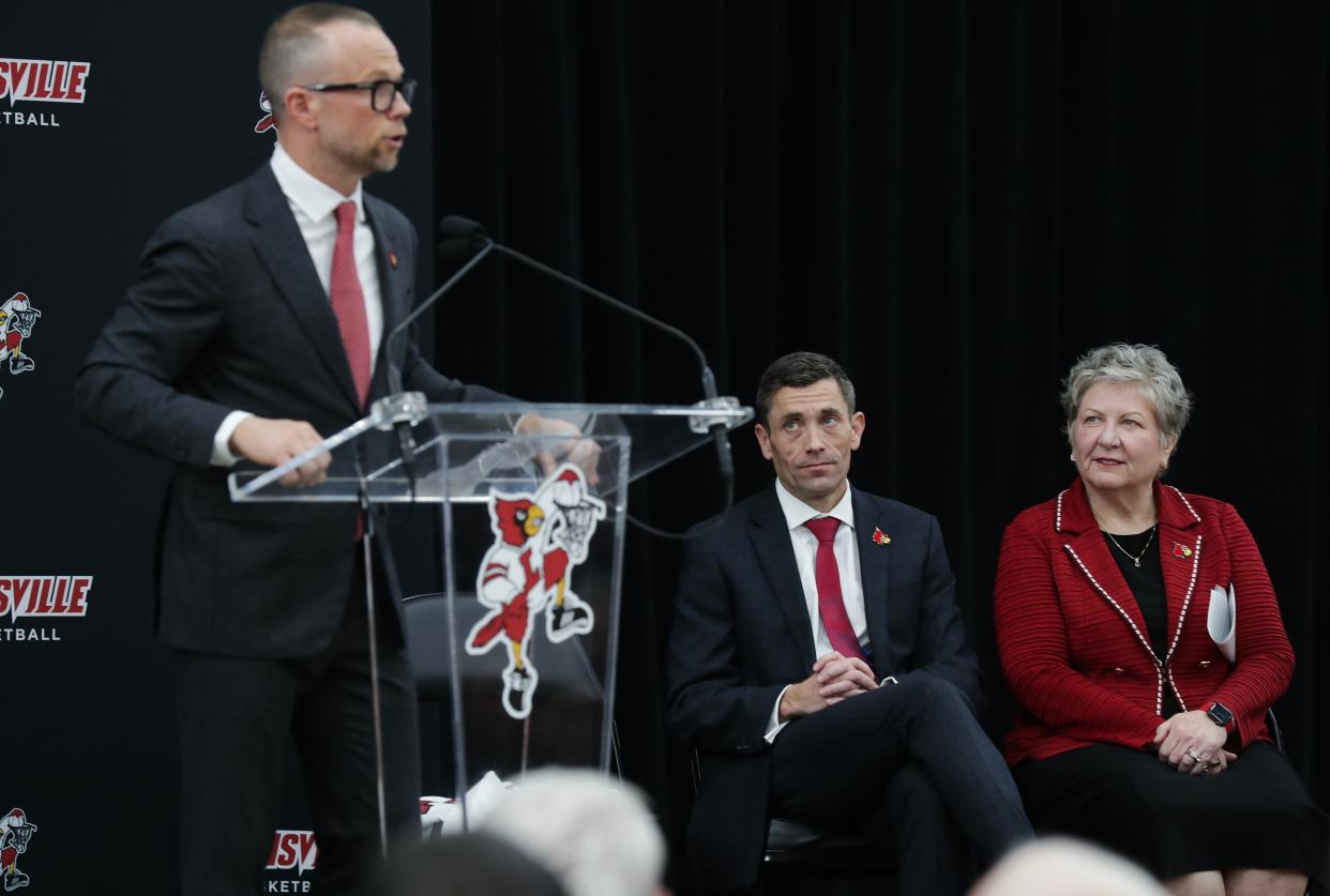 Louisville athletics director Josh Heird, center, and President Dr. Kim Schatzel looked on as Louisville basketball head coach Pat Kelsey was introduced March 28.