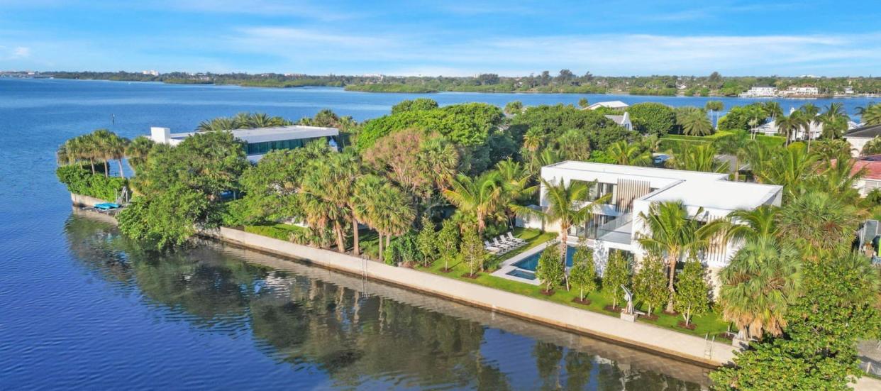 Developer Richard Fertig just sold a new contemporary-style house, right, at 2291 Ibis Isle Road S. on the South End of Palm Bach for a recorded $12.5 million.