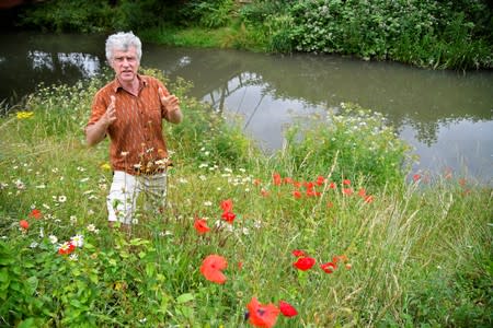 Activist, environmentalist, community leader and undertaker Peter McFadyen stands on the banks of the River Frome, in Frome