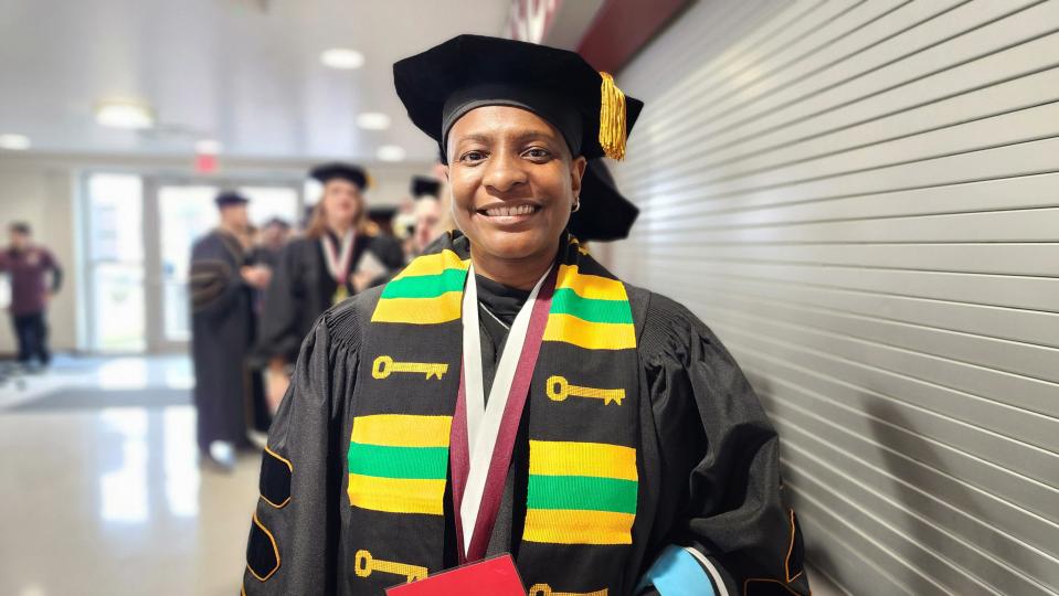 Doctor of Education graduate Mirescha Childs from Houston awaits her chance to walk across stage at the WT commencement ceremony Saturday morning at the First United Bank Center in Canyon.