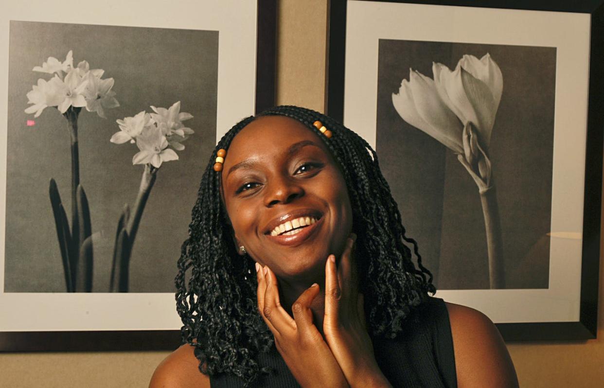 Chimamanda Ngozi Adichie in 2004, shortly after the publication of 'Purple Hibiscus.' <a href="https://www.gettyimages.com/detail/news-photo/nigerian-author-chimamanda-ngozi-adichie-poses-while-in-news-photo/56522066?adppopup=true" rel="nofollow noopener" target="_blank" data-ylk="slk:Ulf Andersen/Getty Images;elm:context_link;itc:0;sec:content-canvas" class="link ">Ulf Andersen/Getty Images</a>