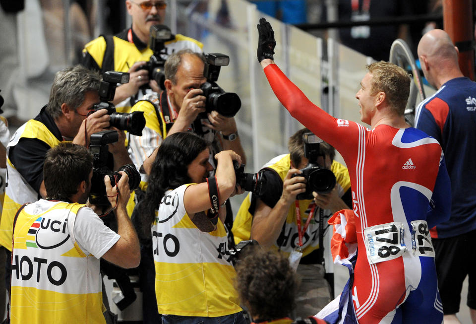 Chris Hoy of Britain (R) celebrates winning the gold medal in the men's keirin at the 2012 Track Cycling World Championships in Melbourne, on April 8, 2012.  IMAGE STRICTLY RESTRICTED TO EDITORIAL USE - STRICTLY NO COMMERCIAL USE  AFP PHOTO/William WEST (Photo credit should read WILLIAM WEST/AFP/Getty Images)