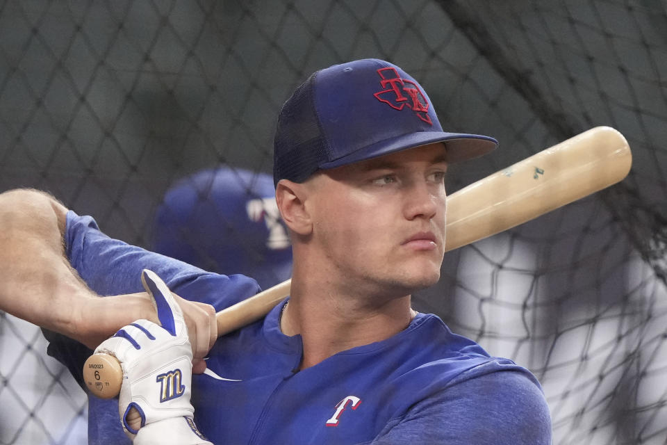 Texas Rangers' Josh Jung takes batting practice before Game 3 of the baseball team's AL Division Series against the Baltimore Orioles in Arlington, Texas, Tuesday, Oct. 10, 2023. (AP Photo/LM Otero)