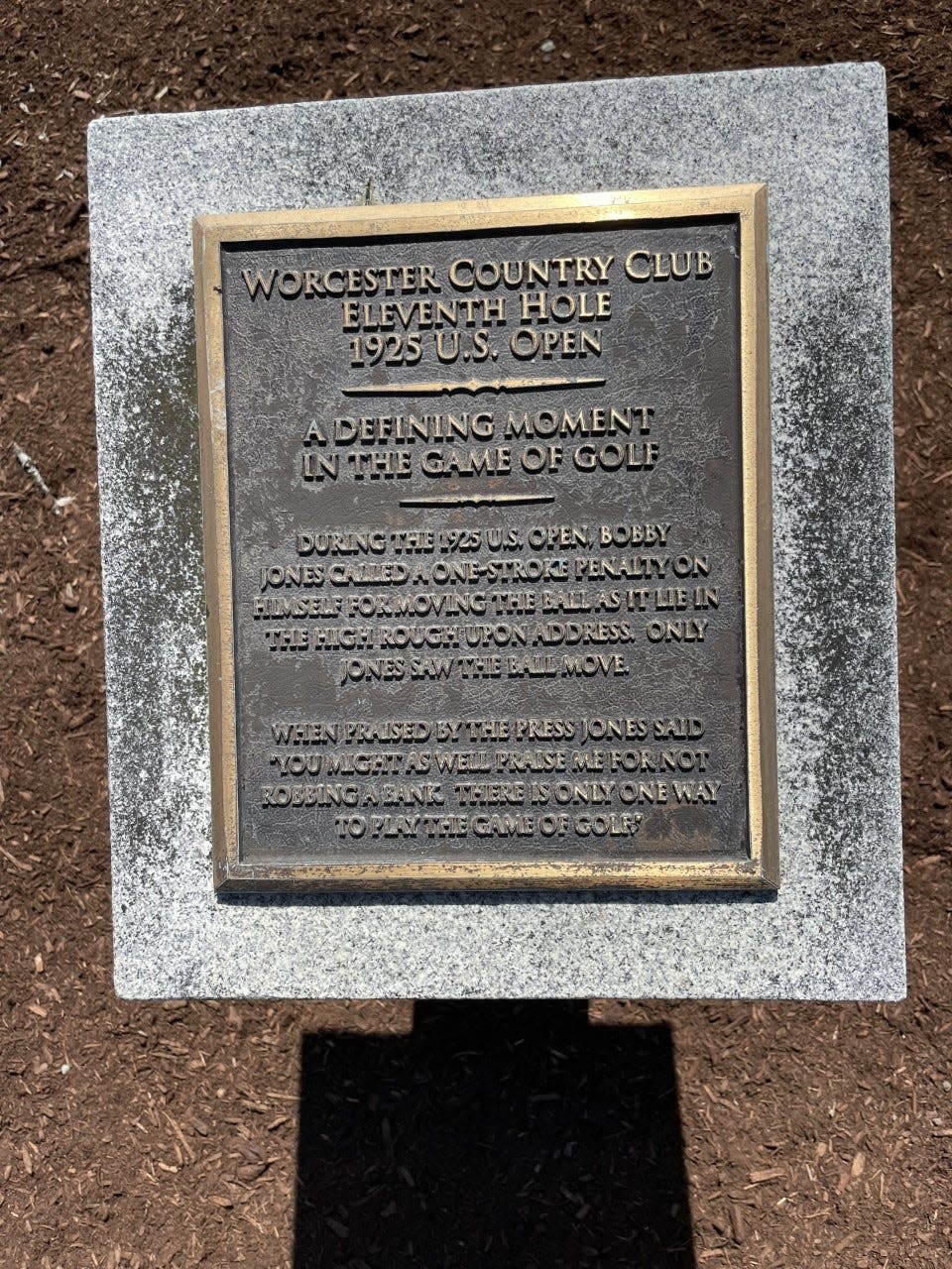 A plaque on the 11th tee at Worcester Country Club commemorates Bobby Jones for calling a penalty stroke on himself in the 1925 U.S. Open. The penalty cost him the championship.