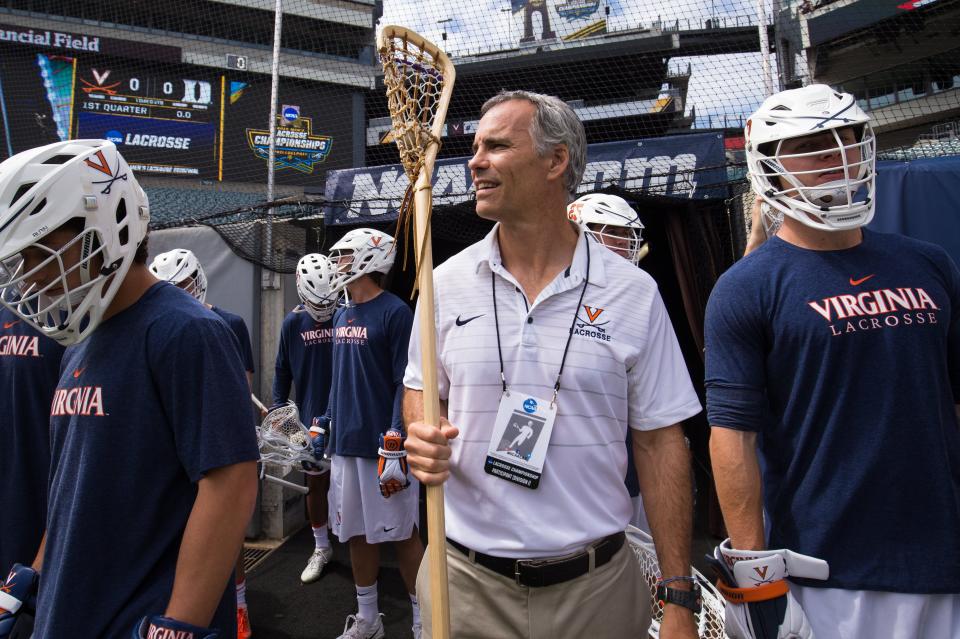 Virginia head coach Lars Tiffany prepares to take the field for warm ups before a game against Duke in the semifinals of the 2019 men's NCAA lacrosse national championship.