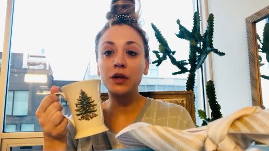 Kaley Cuoco with a coffee cup