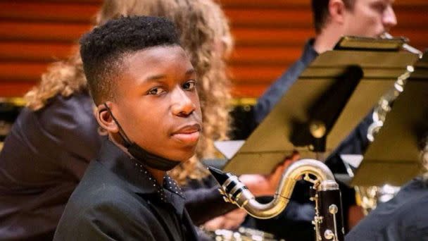 PHOTO: Ralph Yarl, a Black 16-year-old who was shot and wounded by a homeowner after mistakenly going to the wrong house to pick up his siblings, holds a bass clarinet in this picture obtained from social media. (Lee Merritt via Reuters)