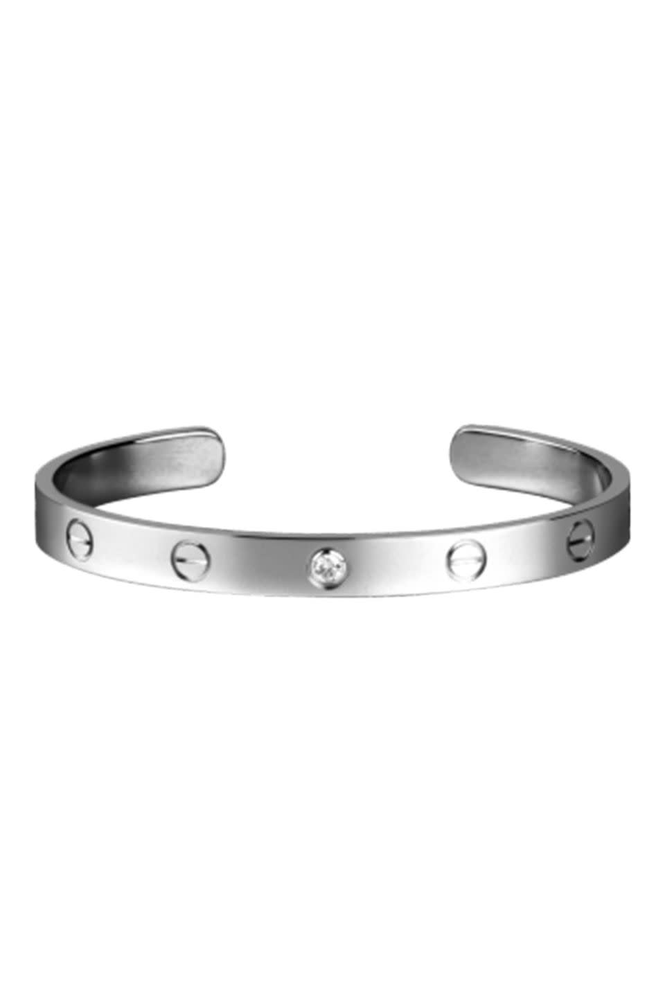 <p>Cartier's love bracelet is a <a rel="nofollow noopener" href="https://www.harpersbazaar.com/uk/fashion/jewellery-watches/news/g36812/10-classic-pieces-of-jewellery-every-woman-should-own/" target="_blank" data-ylk="slk:timeless jewellery staple;elm:context_link;itc:0;sec:content-canvas" class="link ">timeless jewellery staple</a> – and the most searched-for piece of jewellery on Google. We love this one with a subtle diamond detail.</p><p><em>Diamond bracelet, £4,150, Cartier</em></p><p><a rel="nofollow noopener" href="https://www.cartier.co.uk/en-gb/collections/jewelry/collections/love/bracelets/b6032517-love-bracelet.html" target="_blank" data-ylk="slk:BUY NOW;elm:context_link;itc:0;sec:content-canvas" class="link ">BUY NOW</a></p>