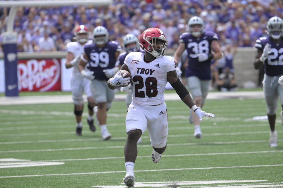Troy running back Kimani Vidal (28) carries against Kansas State during the second half of an NCAA college football game in Manhattan, Kan., Saturday, Sept. 9, 2023. (AP Photo/Reed Hoffmann)