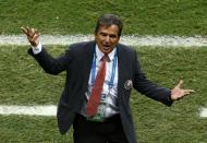 Costa Rica's coach Jorge Luis Pinto gestures during his team's 2014 World Cup quarter-finals against Netherlands at the Fonte Nova arena in Salvador July 5, 2014. REUTERS/Ruben Sprich