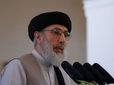 Afghan warlord Gulbuddin Hekmatyar speaks during a welcoming ceremony at the presidential palace in Kabul, Afghanistan May 4, 2017. REUTERS/Omar Sobhani