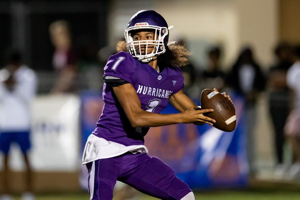 Gainesville Hurricanes quarterback Kane Smith (1) throws the ball during the first half against the Buchholz Bobcats at Citizens Field in Gainesville, FL on Thursday, October 5, 2023. [Matt Pendleton/Gainesville Sun]