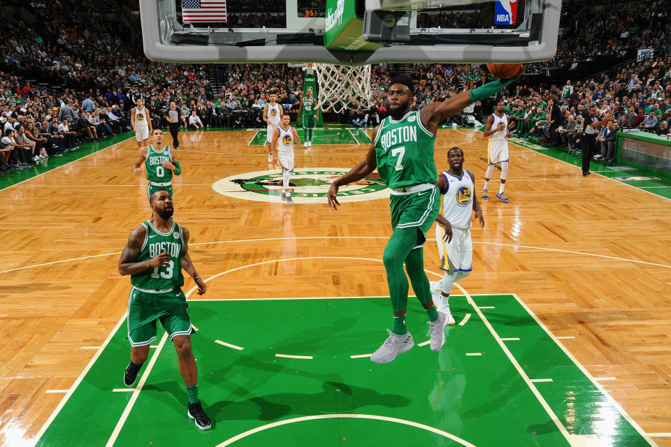 The Celtics’ Jaylen Brown, who scored a team-high 22 points, dunks against Golden State on Thursday night. (Getty Images)