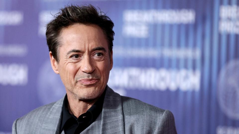 PHOTO: Robert Downey Jr. arrives at the Tenth Breakthrough Prize Ceremony at the Academy Museum of Motion Pictures in Los Angeles, California, on April 13, 2024. (Etienne Laurent/AFP via Getty Images)