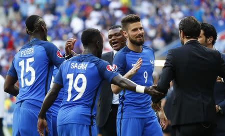 Football Soccer - France v Republic of Ireland - EURO 2016 - Round of 16 - Stade de Lyon, Lyon, France - 26/6/16 Marcel Desailly celebrates with France's Paul Pogba, Bacary Sagna and Olivier Giroud after the game REUTERS/Kai Pfaffenbach Livepic