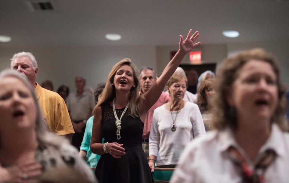 Christian evangelicals attend Sunday service at First Baptist North church in Spartanburg, South Carolina, 2016.