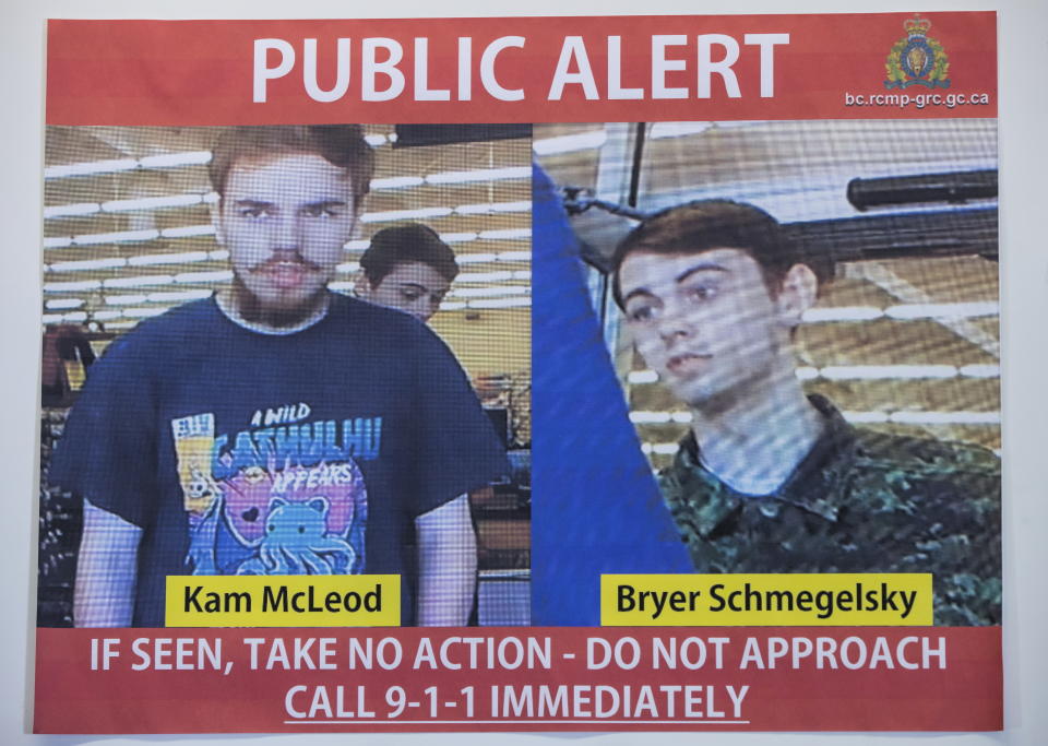 In this July 23, 2019 file photo, security camera images of fugitives Kam McLeod, 19, and Bryer Schmegelsky, 18, are displayed during a news conference in Surrey, British Columbia. Police said Wednesday, Aug. 7, 2019, they believe the two fugitives suspected of killing a North Carolina woman and her Australian boyfriend as well as another man have been found dead in Manitoba. (Darryl Dyck/The Canadian Press via AP File)