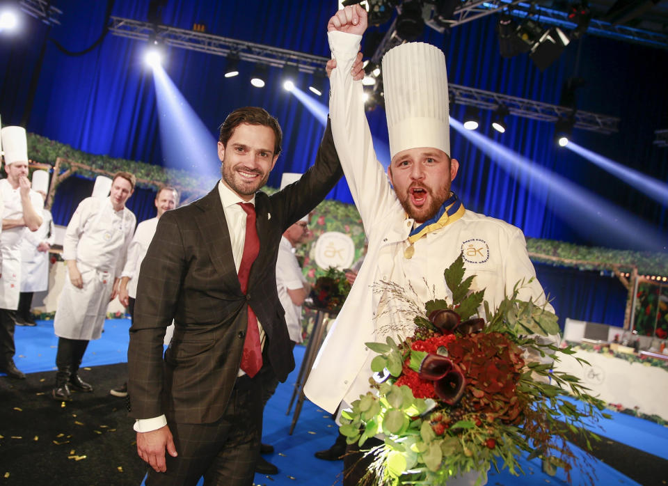 <p>Prince Carl Phillip celebrates Ludwig Tjörnemo's Chef of the Year Award win on Thursday in Stockholm, Sweden.</p>