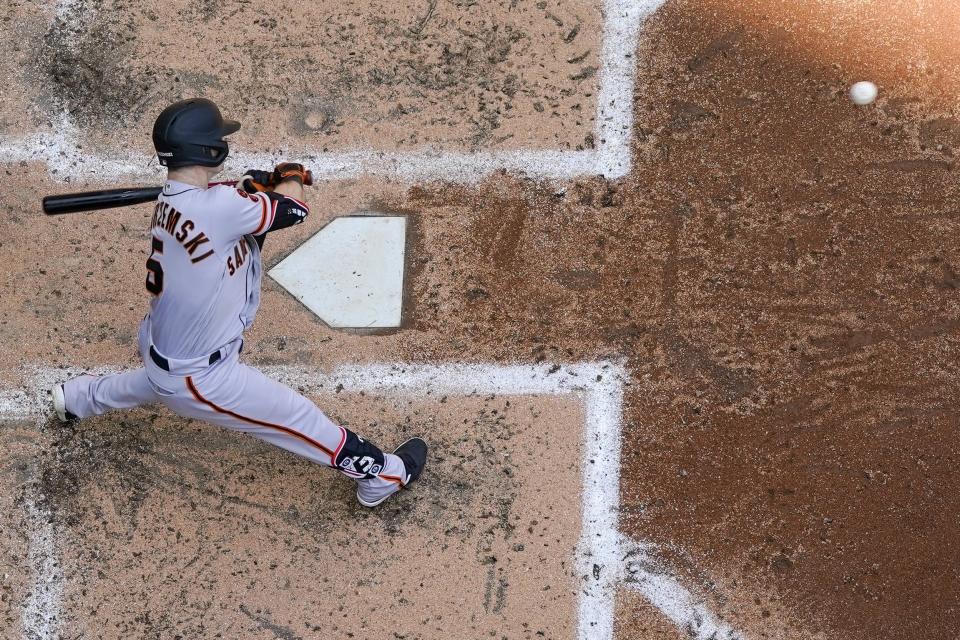 San Francisco Giants' Mike Yastrzemski hits a home run during the third inning of a baseball game against the Milwaukee Brewers Sunday, May 28, 2023, in Milwaukee. (AP Photo/Morry Gash)
