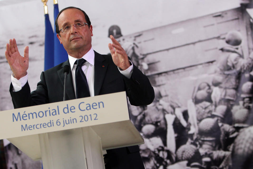 French President Francois Hollande makes a speech at the Caen's Memorial, western France, Wednesday, June 6, 2012, commemorating the 68th anniversary of the D-Day invasion of France which began in 1944. (AP Photo/David Vincent)