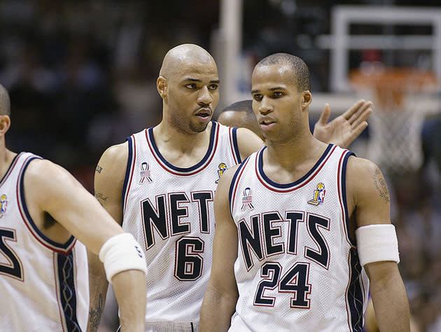 Kenyon Martin sizes Richard Jefferson up. (Getty Images)