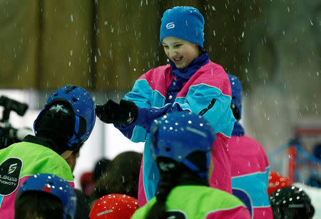 Children enjoys snow in the new Snow City at Al Othaim Mall in Riyadh, Saudi Arabia July 26, 2016. Picture taken July 26, 2016. REUTERS/Faisal Al Nasser